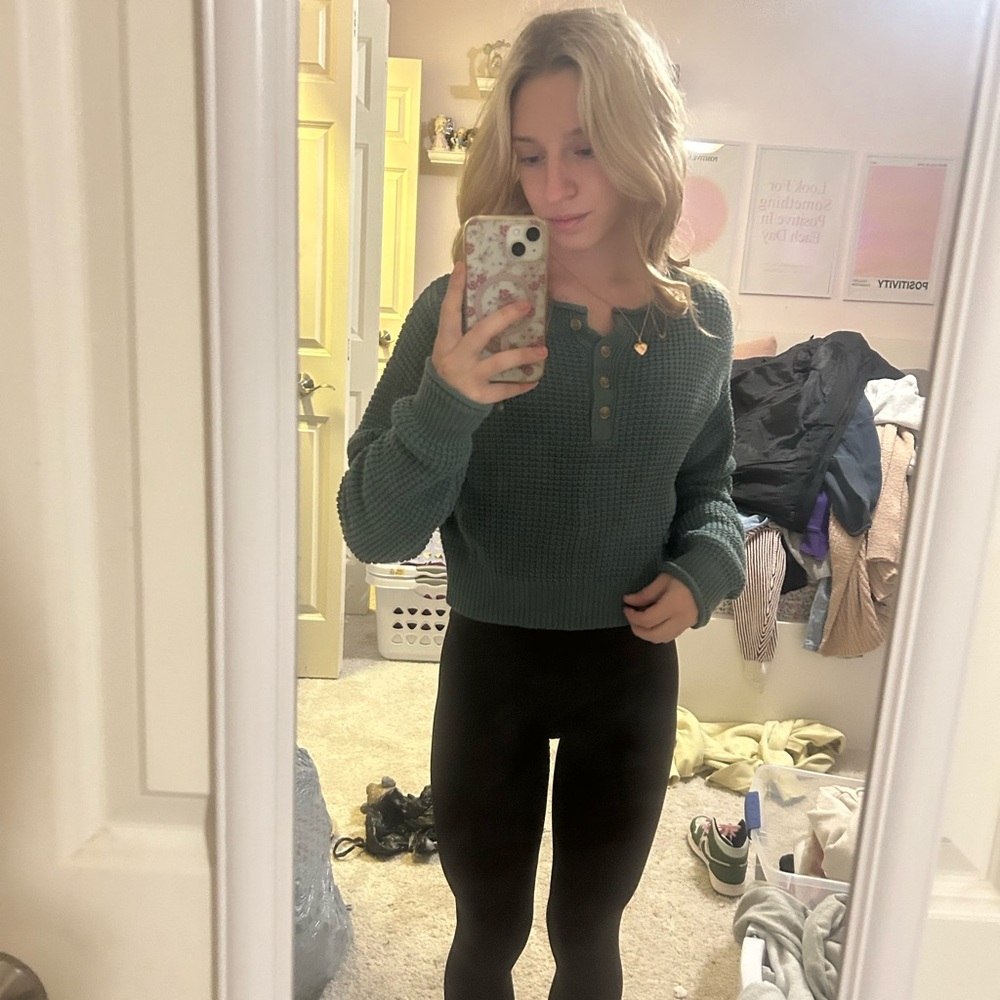 green sweater